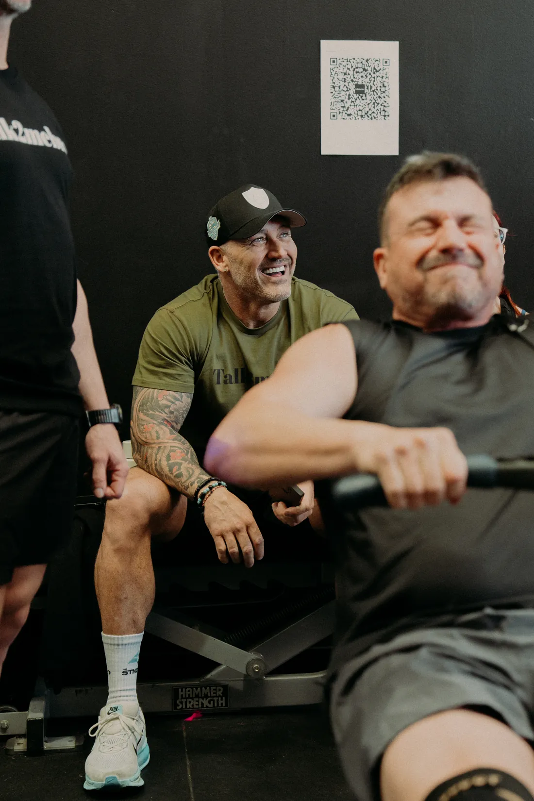 A member grinning through his row