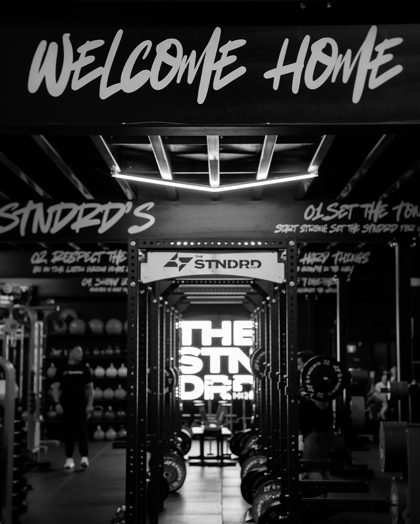 Strength floor rig under the Welcome Home sign